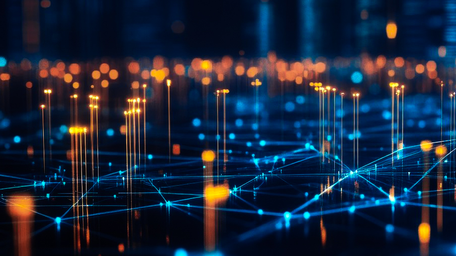 Orange pins of light coming up from a blue grid